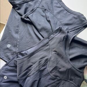 TWO Lululemon black Athletic Tops tank top loose fit